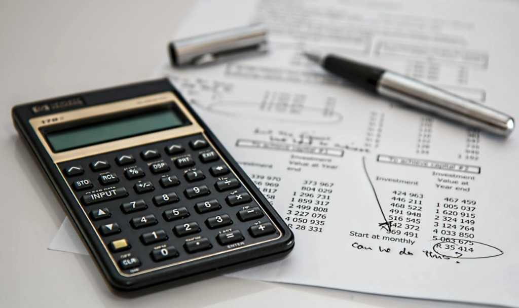 a calculator and some documents